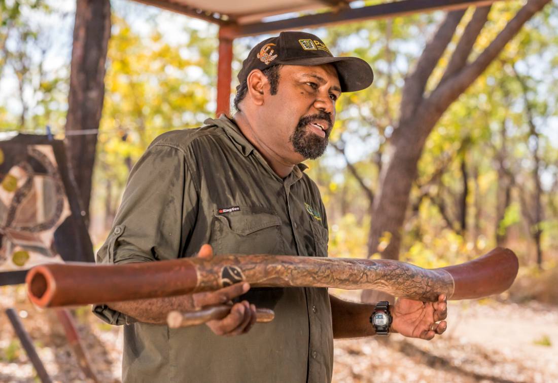 An Indigenous guide shares his knowledge of Aboriginal music during a cultural tour |  <i>Tourism NT/Nick Pincott</i>