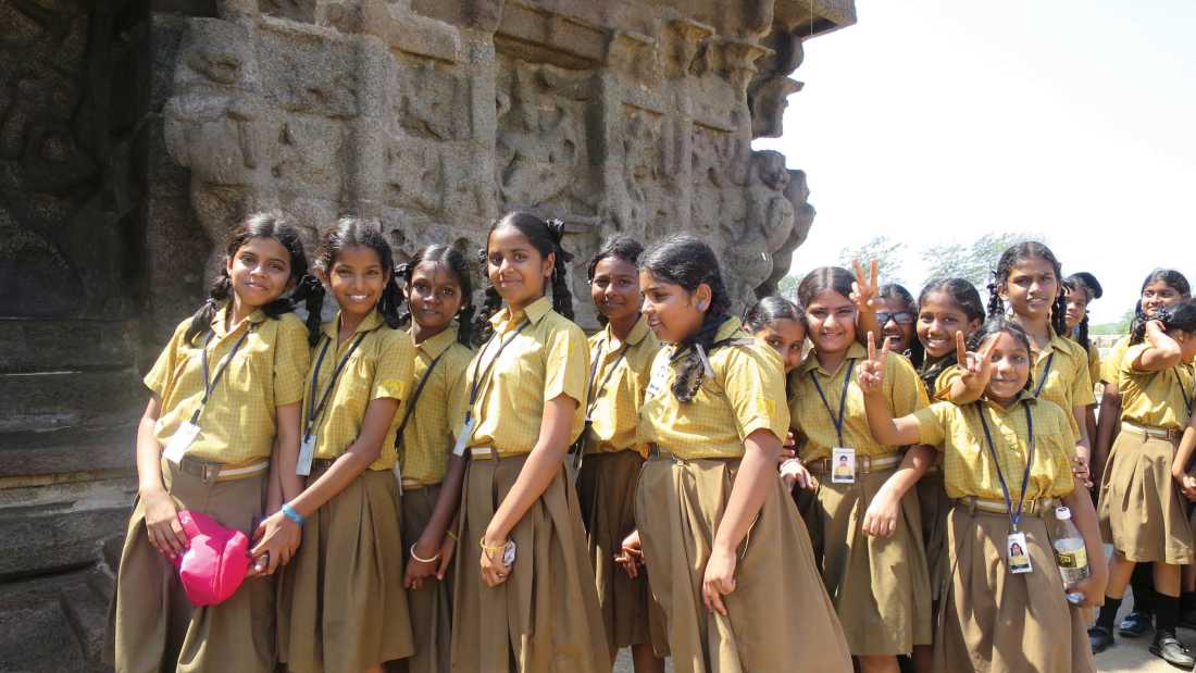 Giggling school girls visiting the Shore Temple in Chennai, Southern India |  Ayla Rowe