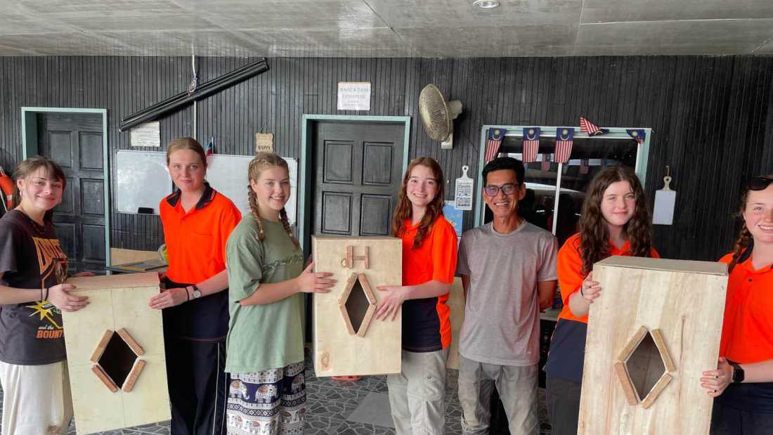 Students constructing bird boxes during their conservation service program